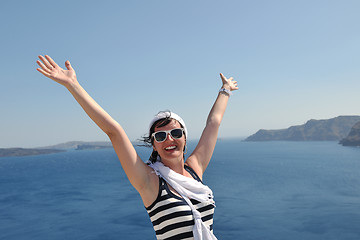 Image showing Greek woman on the streets of Oia, Santorini, Greece