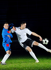 Image showing football players in action for the ball