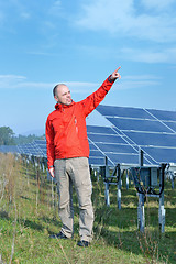 Image showing Male solar panel engineer at work place