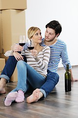 Image showing Young couple moving in new house