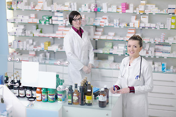 Image showing team of pharmacist chemist woman  in pharmacy drugstore