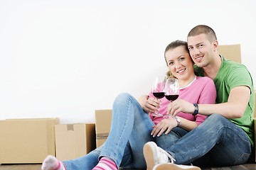 Image showing Young couple moving in new house