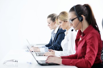 Image showing business woman group with headphones