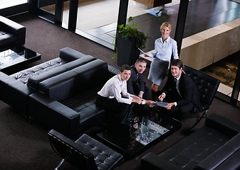 Image showing business people in a meeting at office