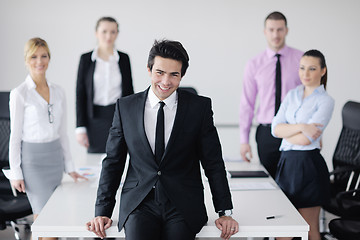 Image showing young business man at meeting