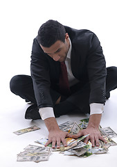 Image showing Business man holding money