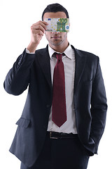 Image showing Business man holding money