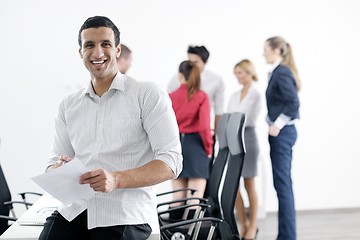 Image showing young business man at meeting