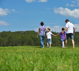 Image showing happy young family have fun outdoors