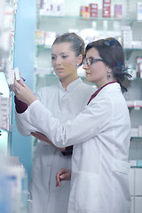 Image showing team of pharmacist chemist woman  in pharmacy drugstore