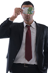 Image showing Business man holding money