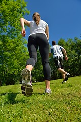 Image showing Young couple jogging at morning