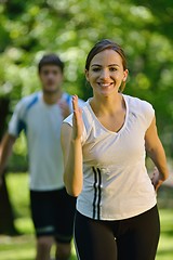 Image showing Young couple jogging at morning