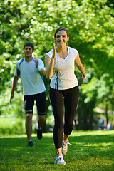 Image showing Young couple jogging at morning