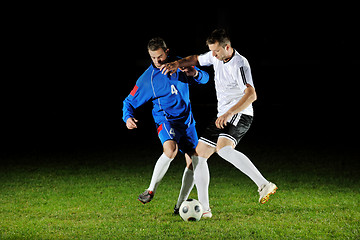 Image showing football players in action for the ball