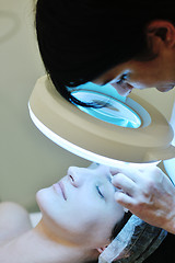 Image showing woman with facial mask in cosmetic studio