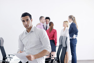 Image showing young business man at meeting