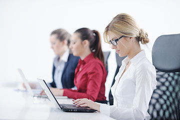 Image showing business woman group with headphones