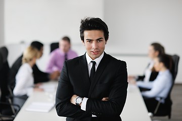 Image showing young business man at meeting