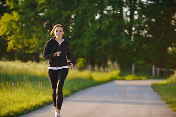 Image showing Young couple jogging