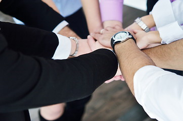 Image showing business people group joining hands