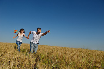 Image showing happy couple in wheat field