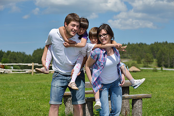 Image showing happy young family have fun outdoors