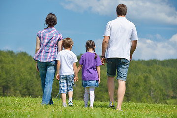 Image showing happy young family have fun outdoors