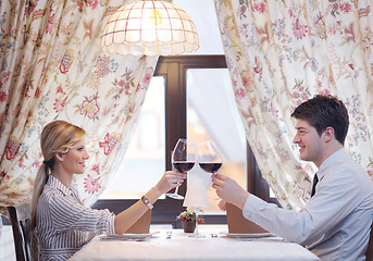 Image showing young couple having dinner at a restaurant