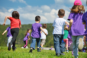 Image showing happy kids group  have fun in nature