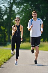 Image showing Young couple jogging at morning