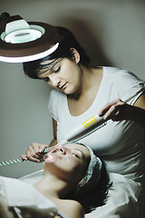 Image showing woman with facial mask in cosmetic studio