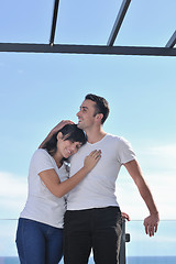 Image showing couple relaxing on balcony