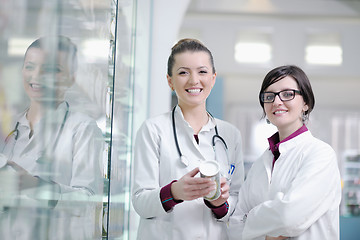 Image showing team of pharmacist chemist woman  in pharmacy drugstore