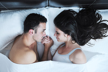 Image showing young couple have good time in their bedroom