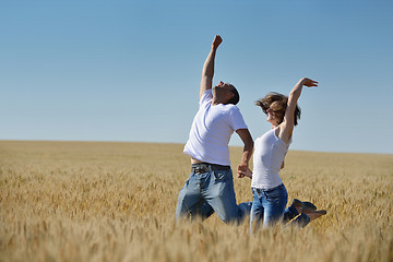 Image showing happy couple in wheat field