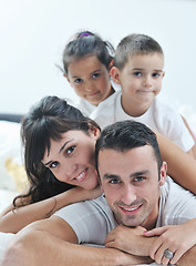 Image showing happy young Family in their bedroom