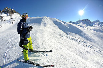 Image showing skiing on fresh snow at winter season at beautiful sunny day