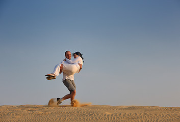 Image showing couple enjoying the sunset