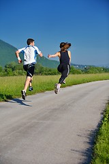 Image showing Young couple jogging at morning