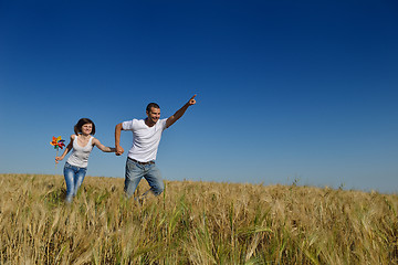 Image showing happy couple in wheat field