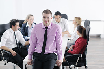 Image showing young business man at meeting