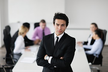 Image showing young business man at meeting