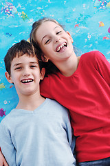 Image showing portrait of happy brother and sister at home