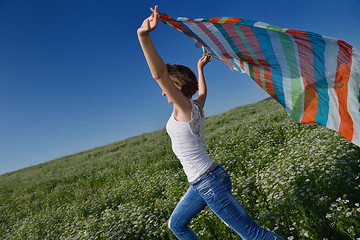 Image showing young woman in wheat field at summer