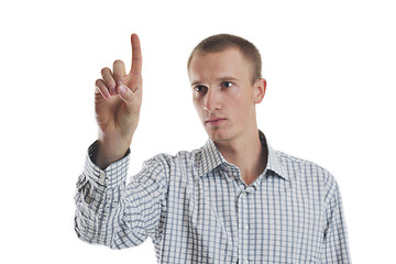 Image showing handsome young business man touching screen isolated