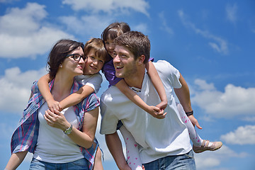 Image showing happy young family have fun outdoors