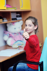 Image showing girl doing homework