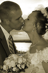 Image showing wedding kiss in sepia colorous