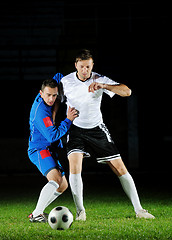 Image showing football players in action for the ball
